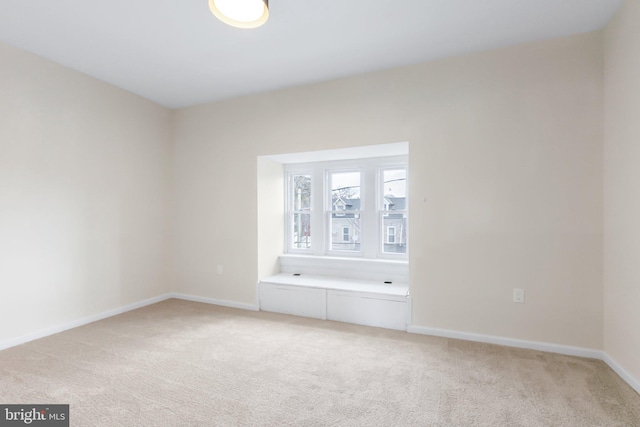 empty room featuring carpet floors