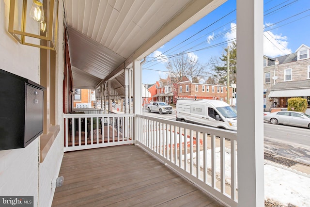 wooden deck featuring a porch