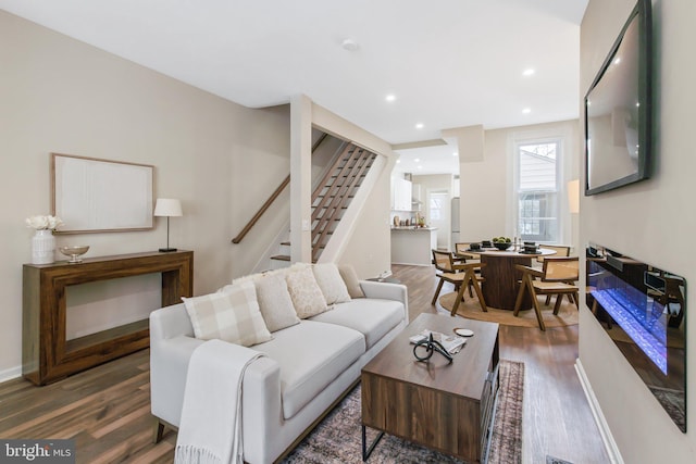 living room with dark wood-type flooring