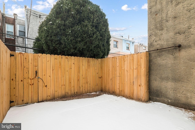 view of yard covered in snow