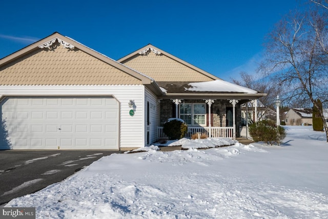 view of front facade featuring a garage and a porch