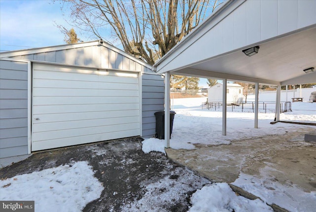 view of snow covered garage