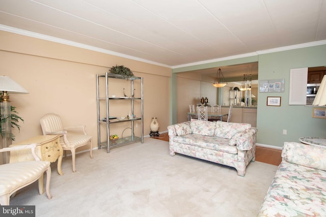 living room with crown molding and carpet flooring