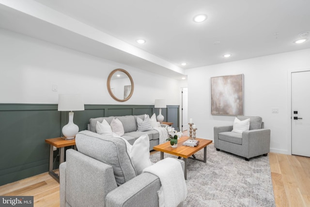 living room with light hardwood / wood-style flooring