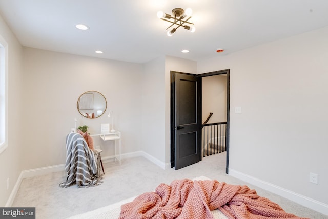 bedroom with light colored carpet