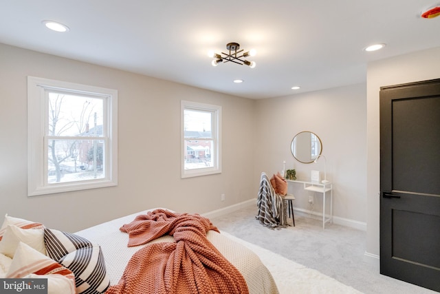 bedroom with light colored carpet