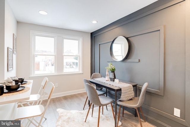 dining area featuring light hardwood / wood-style flooring