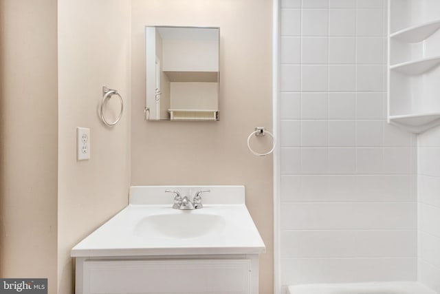 bathroom featuring vanity and separate shower and tub