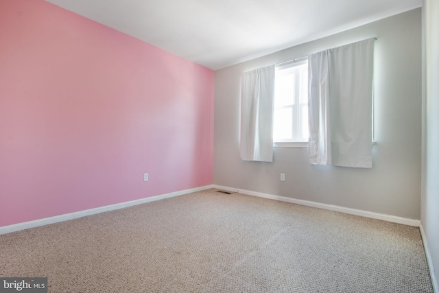 view of carpeted spare room