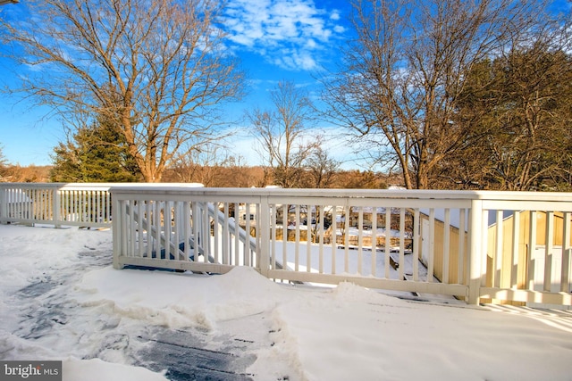 view of snow covered deck