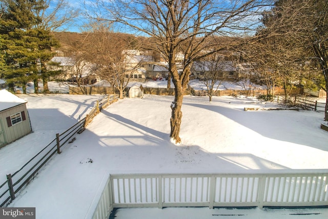 view of yard covered in snow