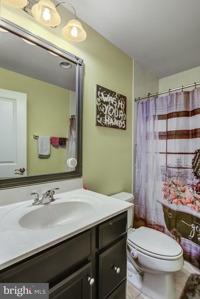 bathroom with walk in shower, tile patterned floors, vanity, and toilet