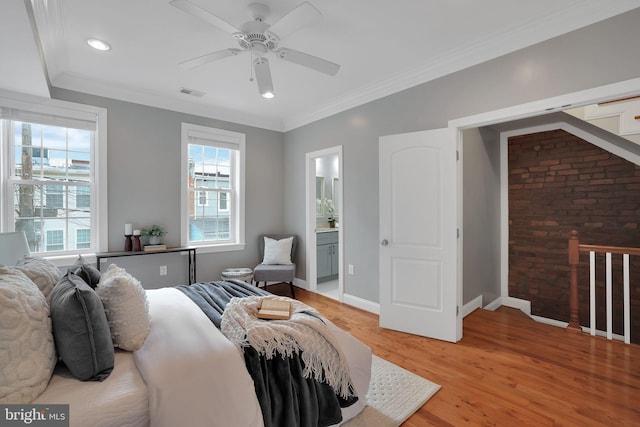 bedroom with ceiling fan, ornamental molding, ensuite bathroom, and light hardwood / wood-style flooring