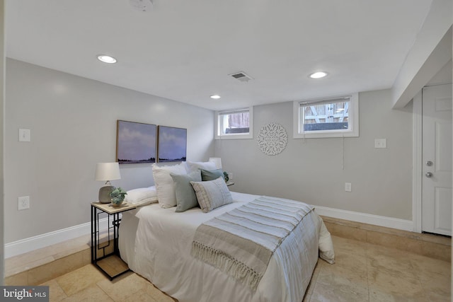 bedroom featuring light tile patterned floors