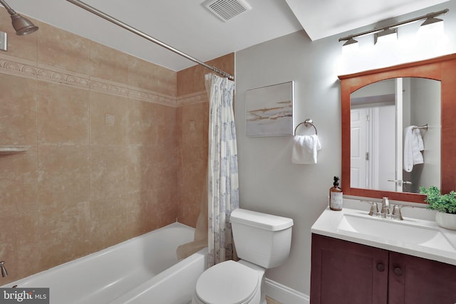 full bathroom with vanity, toilet, and shower / bath combo with shower curtain