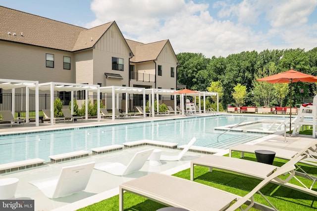 view of pool featuring a patio and a pergola