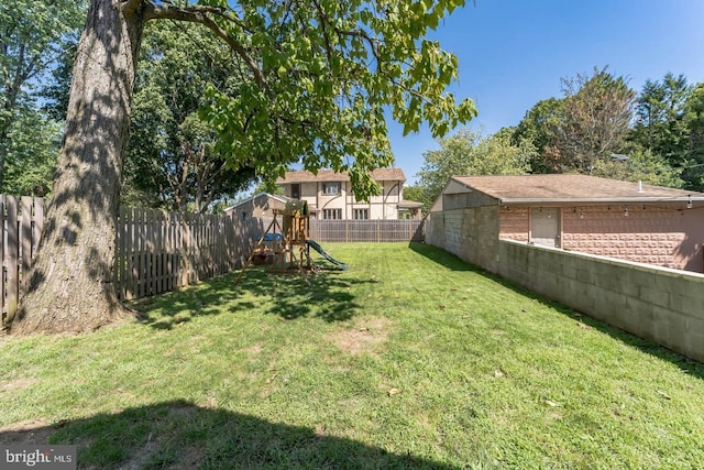 view of yard with a playground