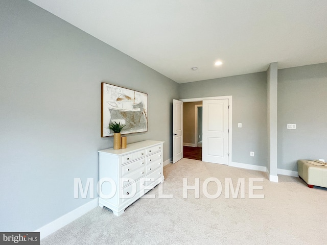 unfurnished bedroom featuring light colored carpet