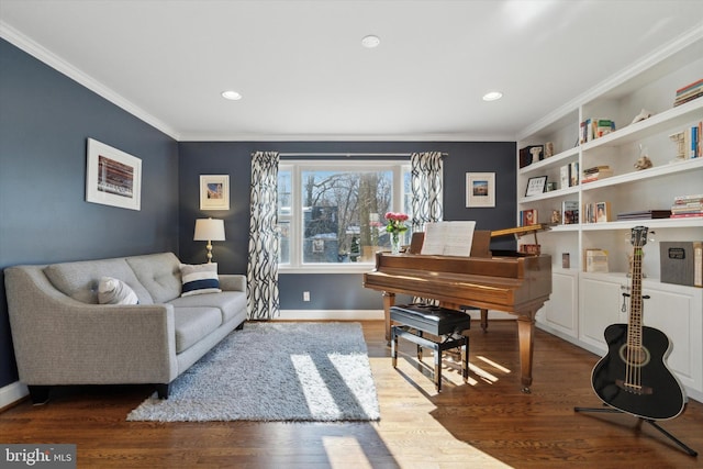 interior space featuring ornamental molding, dark hardwood / wood-style floors, and built in features