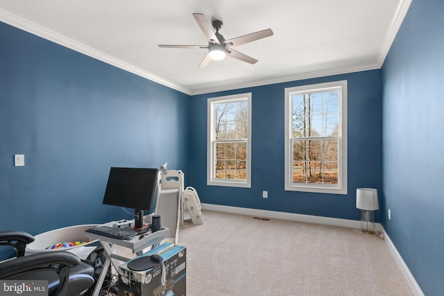 carpeted office featuring ceiling fan and ornamental molding