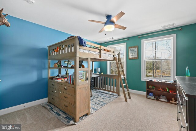 bedroom with light colored carpet