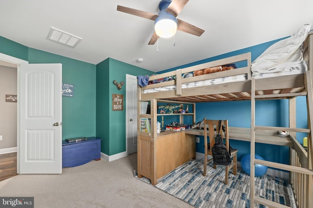 carpeted bedroom featuring ceiling fan