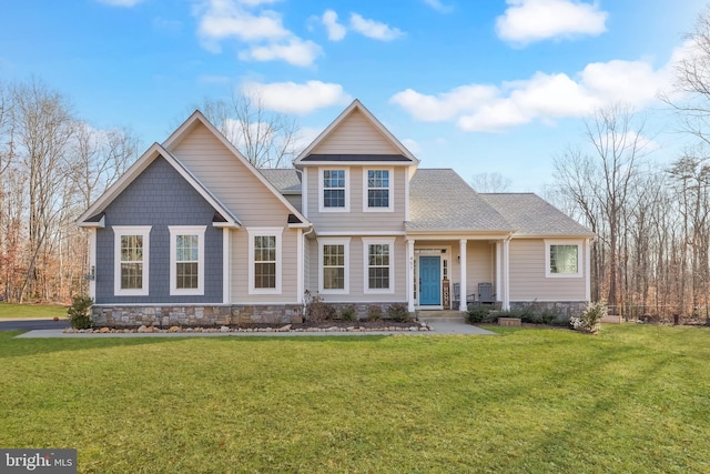 view of front of home with a front lawn