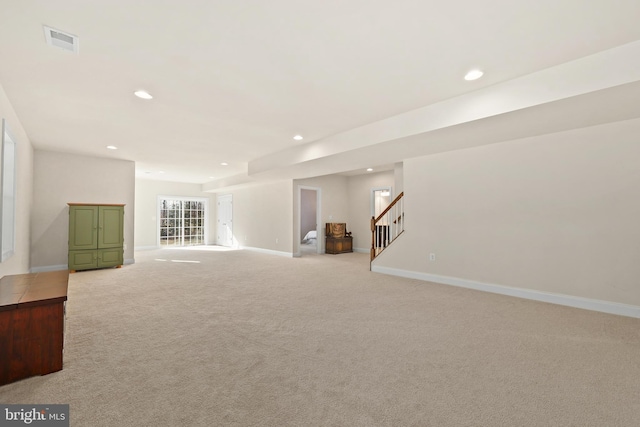 basement with light colored carpet