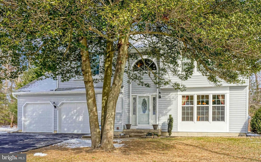 view of front of home featuring a garage