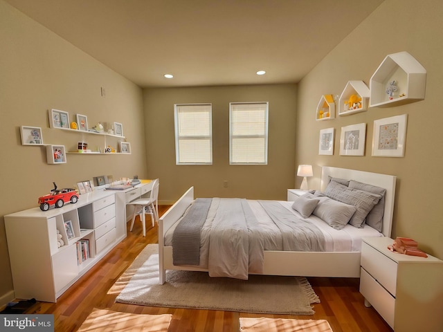 bedroom with light hardwood / wood-style floors