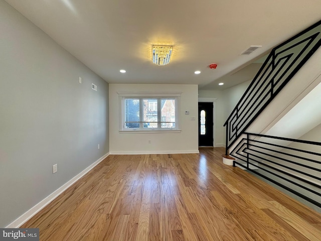 foyer entrance featuring light wood-type flooring