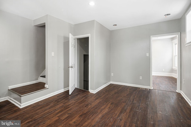 interior space with dark hardwood / wood-style floors