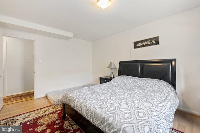 bedroom featuring hardwood / wood-style floors