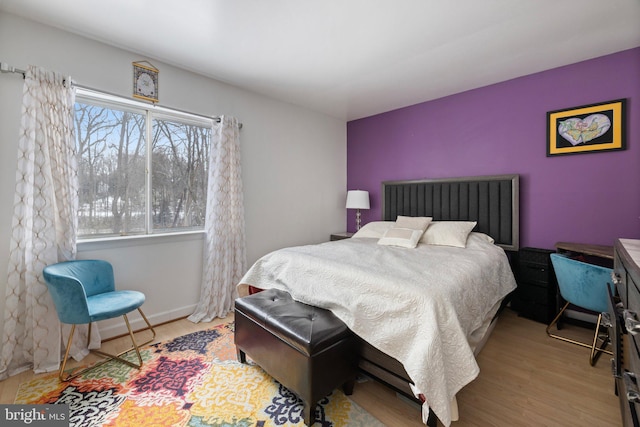 bedroom featuring light hardwood / wood-style floors