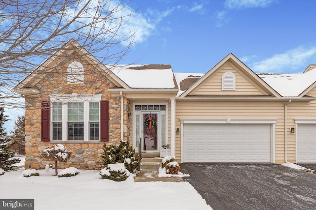 view of front of property featuring a garage