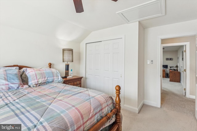 bedroom featuring light carpet, a closet, and ceiling fan