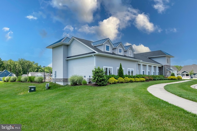 view of home's exterior featuring a lawn