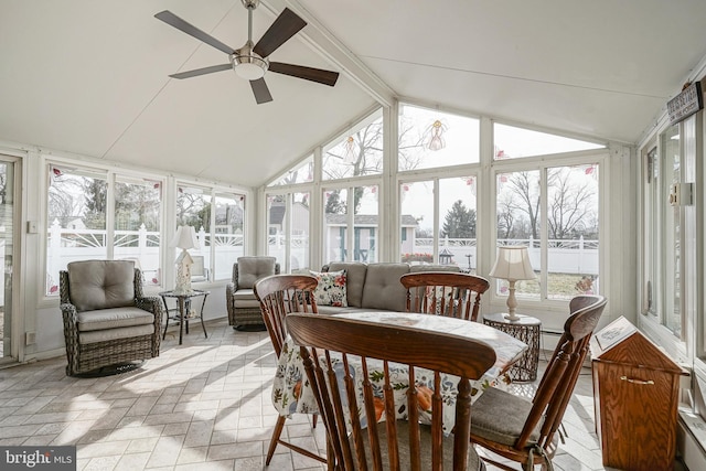 sunroom / solarium with lofted ceiling with beams and ceiling fan