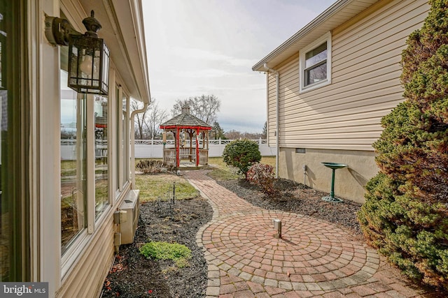 view of yard featuring a gazebo and a patio