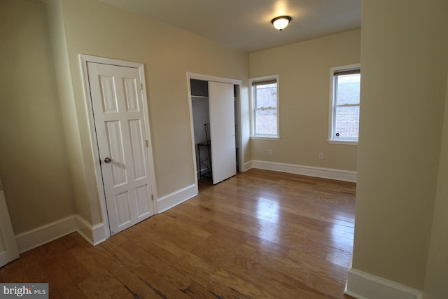 unfurnished bedroom with light hardwood / wood-style flooring