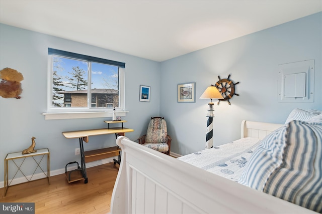 bedroom featuring hardwood / wood-style floors