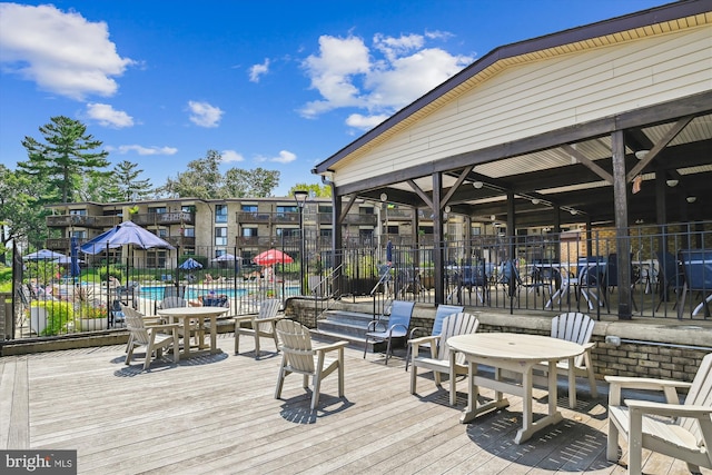 dock area with a community pool