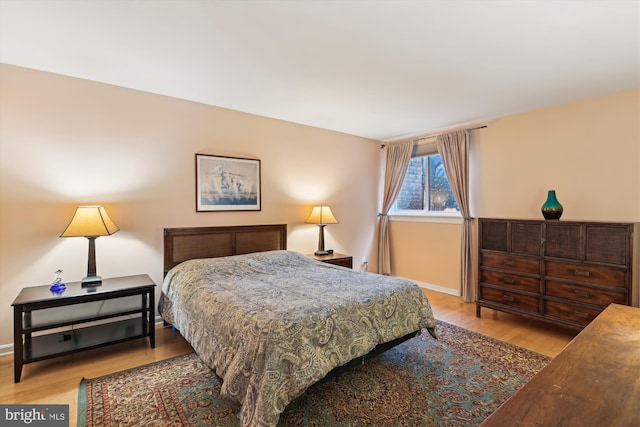 bedroom featuring light wood-type flooring