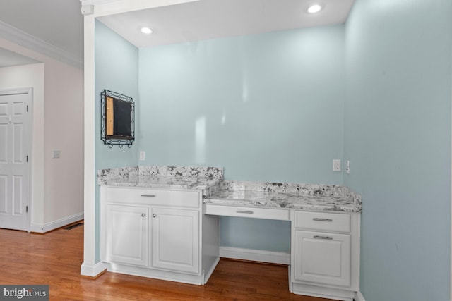 bathroom with hardwood / wood-style flooring