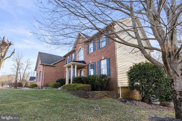 view of home's exterior featuring a lawn