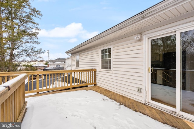 view of snow covered deck