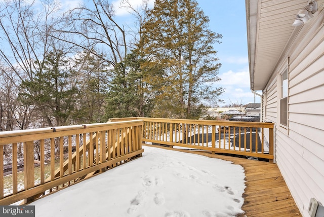 view of snow covered deck