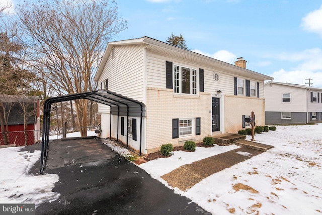 view of front of house featuring a carport