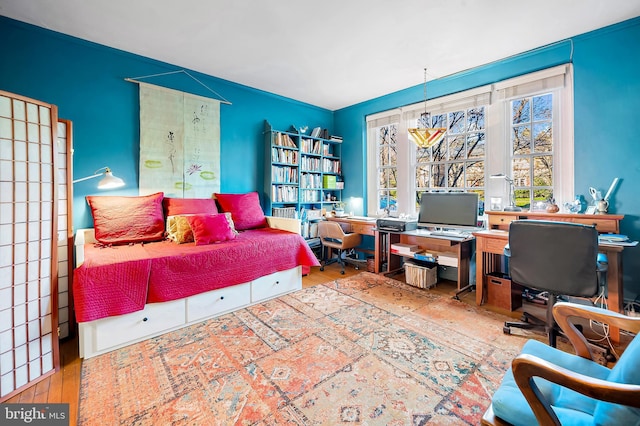 home office featuring hardwood / wood-style flooring