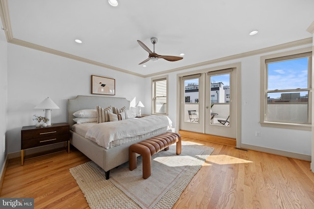 bedroom featuring access to exterior, multiple windows, light wood-type flooring, and ornamental molding